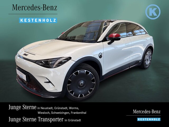 Interne Fahrzeugnr.:: 0923851Exterieur:  Antriebsart: Heckantrieb,   Außenspiegel elektr. verstell- und heizbar, mit Memory,   Außenspiegel mit Abblendautomatik,   Außenspiegel mit Umfeldleuchte und Projektionsfunktion,   Blinkleuchten mit Lauflicht vorn und hinten,   Dachreling / Dachträgervorrüstung,   Dach Wagenfarbe,   Einstiegsleisten (Edelstahl) beleuchtet,   Elektromotor 200 kW (cont. 75 kW),   Getriebe für Elektrofahrzeug,   Heckleuchten LED,   Intelligentes Batteriemanagementsystem mit Temperaturregelung,   Karosserie 5-türig,   Komfort-Fahrwerk,   Kühlergrill, Aktive Luftklappen,   Matrix-LED-Scheinwerfer,   Metallic-Lackierung,   Radstand Standard,   Seitenscheiben hinten und Heckscheibe dunkel getönt (Privacy Glass),   Türgriffe außen ausfahrbar / versenkbar, elektrisch,   Türgriffe außen mit LED-BeleuchtungInterieur:  2-Zonen Klimaautomatik,   Ambiente-Beleuchtung Plus,   Brillenfach,   elektronisches Gaspedal,   Frontstaufach / Frunk (Kofferraum, vorn),   Gepäckraumabdeckung / Rollo,   Getränkehalter in Mittelkonsole,   Innenausstattung: Interieur Nebula White,   Innenspiegel mit Abblendautomatik,   Instrumententafel Leder-Optik,   Kopf-Airbag-System (Windowbag),   Mittelarmlehne hinten mit Getränkehalter,   Mittelkonsole mit Kühlfunktion,   Rücksitzbank geteilt/klappbar (60:40),   Rücksitzlehnen neigungsverstellbar,   Sitzbezug / Polsterung: Duo-Leder,   Sitze vorn elektr. verstellbar (6-fach) mit Lendenwirbelstütze,   Sitzheizung,   Steckdose (12V-Anschluß) im Koffer-/Laderaum,   Wärmepumpe für Heizungs-/KlimaanlageMultimedia:  Anzeigeinstrumente Full LCD HD (9,2" Farbdisplay),   Bluetooth-Schnittstelle,   Head-Up Display,   Induktionsladeschale für Smartphone,   Infotainment-Center 12,8 Zoll Display (Touchscreen),   Lautsprecher,   Premium-Sound-System (Beats),   Radioempfang digital (DAB),   Smartphone Schnittstelle (Apple CarPlay &amp; Android Auto),   Steckdose (12V-Anschluß),   USB-Anschlüsse, je 2 vorn und hintenKomfort und Umwelt:  Adaptive Geschwindigkeitsregelanlage (ACC) mit Stop&amp;Go-Funktion,   Aktiver Spurhalteassistent,   Anhänger-Stabilisierungs-Programm (TSA),   Ausweich-Assistent (EMA),   Auto-Hold-Funktion,   Automatische Begleitfunktion der Beleuchtung (Follow me home),   Bremsenergierückgewinnung (Rekuperationssystem),   Einparkhilfe vorn und hinten, 12 Parksensoren,   Fahrassistenz-System: Aufmerksamkeits-Assistent,   Fahrassistenz-System: Autonomer Notbrems-Assistent,   Fahrassistenz-System: Berg-Anfahr-Assistent,   Fahrassistenz-System: Bergabfahrkontrolle (HDC),   Fahrassistenz-System: Frontkollisionswarnung (FCM),   Fahrassistenz-System: Intelligente Geschwindigkeitsanpassung (ISA),   Fahrassistenz-System: Kollisionswarnsystem hinten (RCM),   Fahrassistenz-System: Notfall-Spurhalteassistent (Emergency Lane Keeping, ELK),   Fahrassistenz-System: Pannenmanagement (bCall),   Fahrassistenz-System: Park-Notbremse (PEB),   Fahrassistenz-System: Parkassistenzsystem (Park Assist),   Fahrassistenz-System: Pilot Assist,   Fahrassistenz-System: Querverkehrs-Assistent Heck (RCTA),   Fahrassistenz-System: Querverkehrs-Assistent vorn (FCTA),   Fahrassistenz-System: Spurhalteassistent,   Fahrassistenz-System: Spurverlassenswarnung (LDW),   Fahrassistenz-System: Spurwechselassistent (LCA),   Fahrassistenz-System: Totwinkel-Assistent (BSD),   Fahrassistenz-System: Verkehrszeichenerkennung (TSR),   Heckklappe/-Deckel elektr. betätigt (öffnen + schliessen, sensorgesteuert),   Isofix-Aufnahmen für Kindersitz,   Isofix-Aufnahmen für Kindersitz an Rücksitz,   Kamerasystem 360 Grad,   Keyless-Entry,   Lenkrad (Leder, perforiert) mit Multifunktion,   Lenkrad (Sport) mit Multifunktion,   Lenksäule (Lenkrad) verstellbar,   Memoryfunktion für Sitz vorn links,   Mittelarmlehne hinten klappbar mit Durchlademöglichkeit,   Panorama-Glasdach,   Regensensor,   ServolenkungSicherheit:  Airbag Fahrer-/Beifahrerseite,   Anti-Blockier-System (ABS),   Elektron. Stabilitäts- und Traktionskontrolle,   Kurvenbremskontrolle (Corner-Brake-Control CBC),   Notrufsystem eCall,   Parkbremse elektrisch,   Reifendruck-Kontrollsystem,   Seitenairbag,   Seitenairbag vorn mitte (Center-Airbag),   Sicherheitsgurte vorn höhenverstellbar,   Türöffnungswarnung (DOW),   Überschlag-Schutzsystem,   WegfahrsperreWeiteres:  Einstiegshilfe Easy-Entry,   Fahrassistenz-System: Adaptiver Fernlichtassistent,   Luftqualitäts-Überwachungssystem (Air-Quality-System, AQS),   Elektromotor 200 kW,   HV-Batterie 66 kWh brutto / 62 kWh netto.